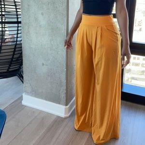 Yellow/gold, wide leg pants. Soft and comfortable, can be dressed up or down.